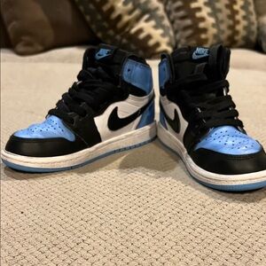 Nike Kids' Black and Blue High-Top Sneakers
Jordans